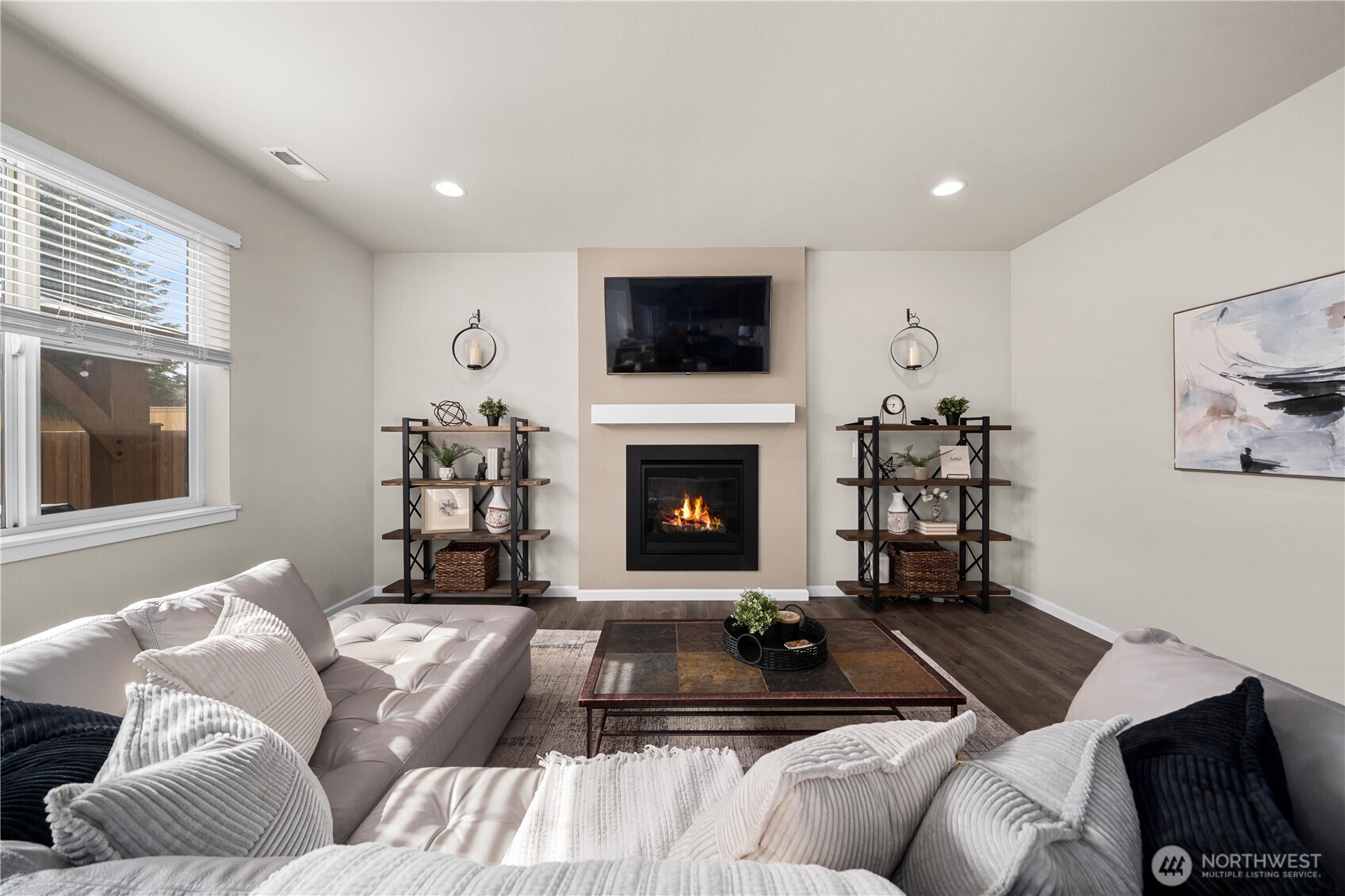 26239 227th Terrace Southeast Maple Valley, WA 98038 - Photo 12 of 37 a living room with furniture and a flat screen tv