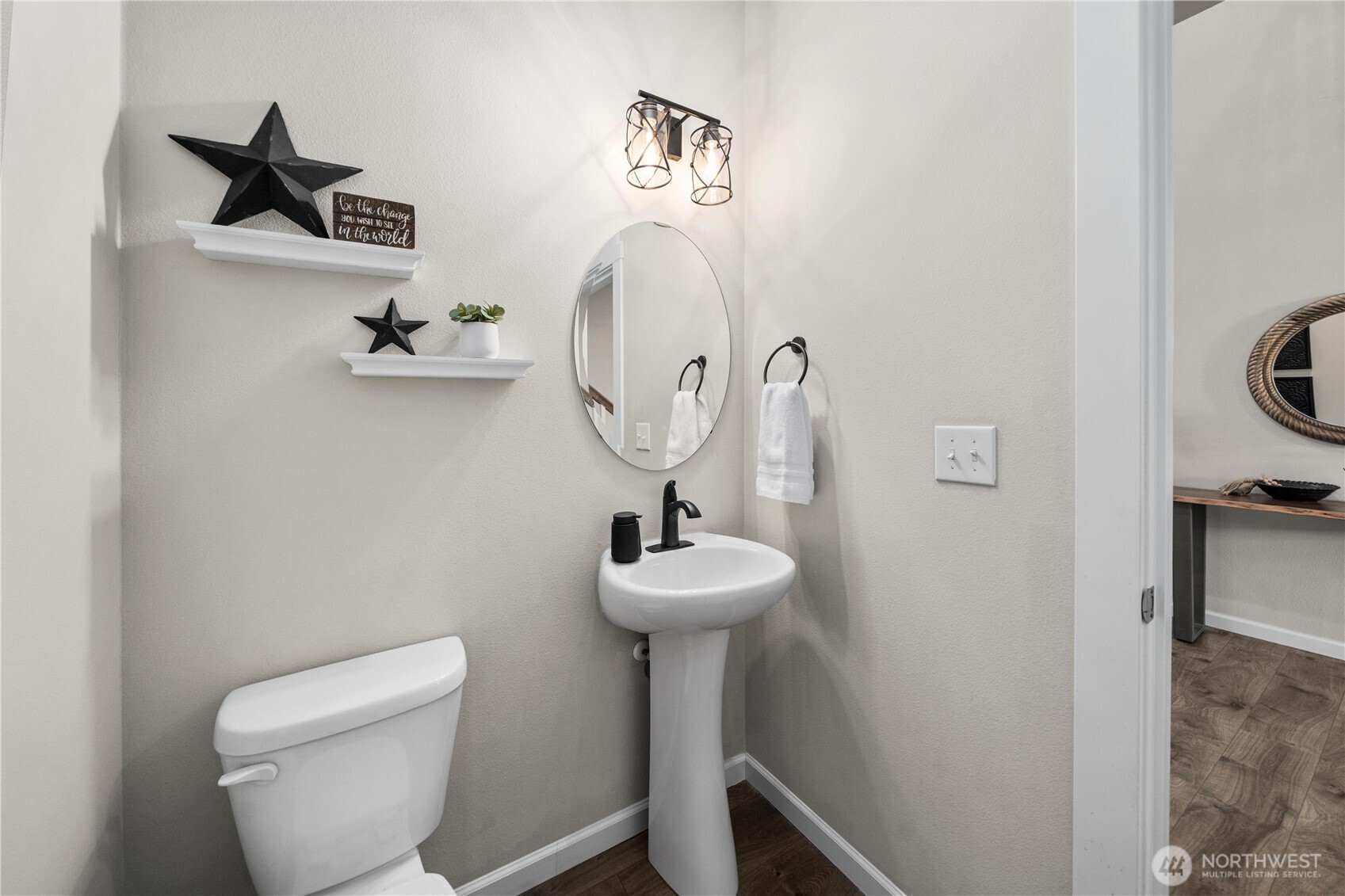 26239 227th Terrace Southeast Maple Valley, WA 98038 - Photo 17 of 37 a bathroom with a sink mirror and toilet