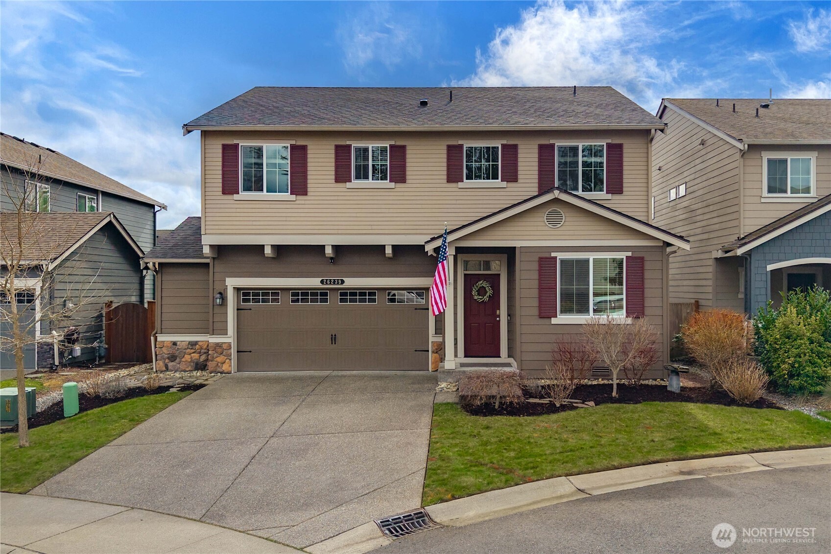 26239 227th Terrace Southeast Maple Valley, WA 98038 - Photo 2 of 37 front view of a house with a yard