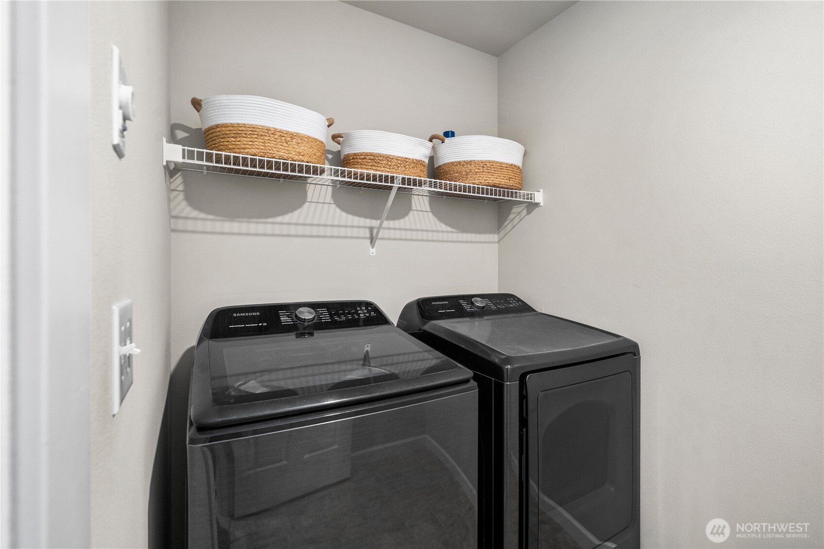 26239 227th Terrace Southeast Maple Valley, WA 98038 - Photo 29 of 37 a utility room with dryer and stove