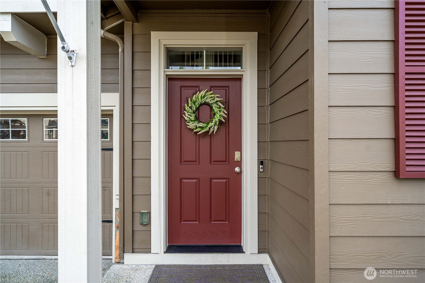 26239 227th Terrace Southeast Maple Valley, WA 98038 - Photo 3 of 37 a view of front door of house