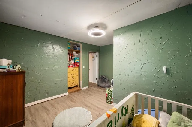 a bathroom with a tub and a sink