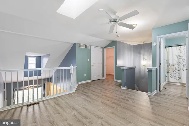 a view of a livingroom with a ceiling fan