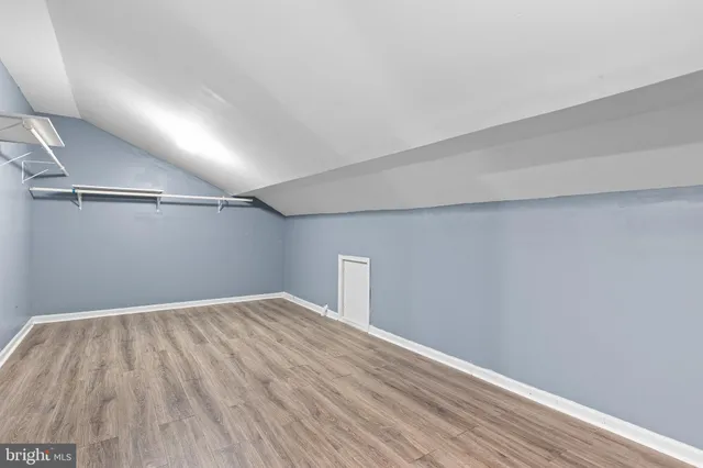 a view of a big room with wooden floor