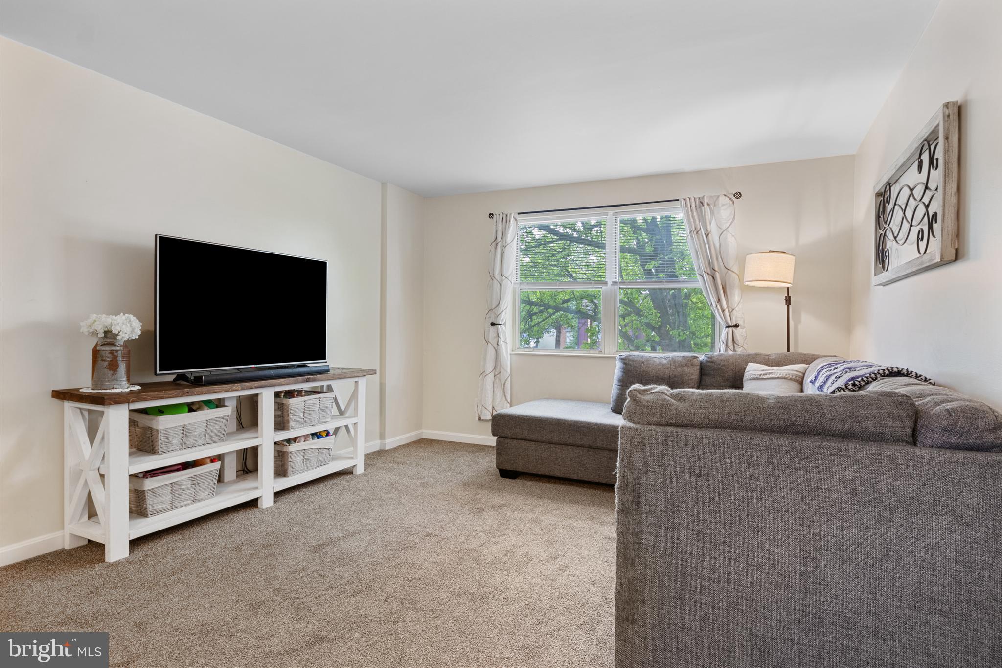 3530 Middleboro Road Dover, PA 17315 - Photo 12 of 57 a living room with furniture and a flat screen tv