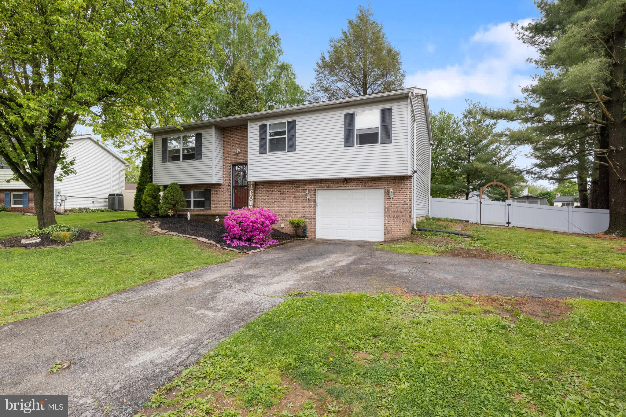 3530 Middleboro Road Dover, PA 17315 - Photo 4 of 57 a front view of house with yard and trees