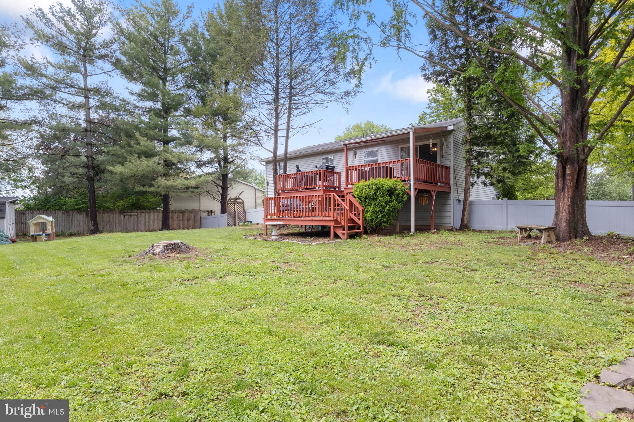 3530 Middleboro Road Dover, PA 17315 - Photo 42 of 57 a view of a backyard with a garden and entertaining space