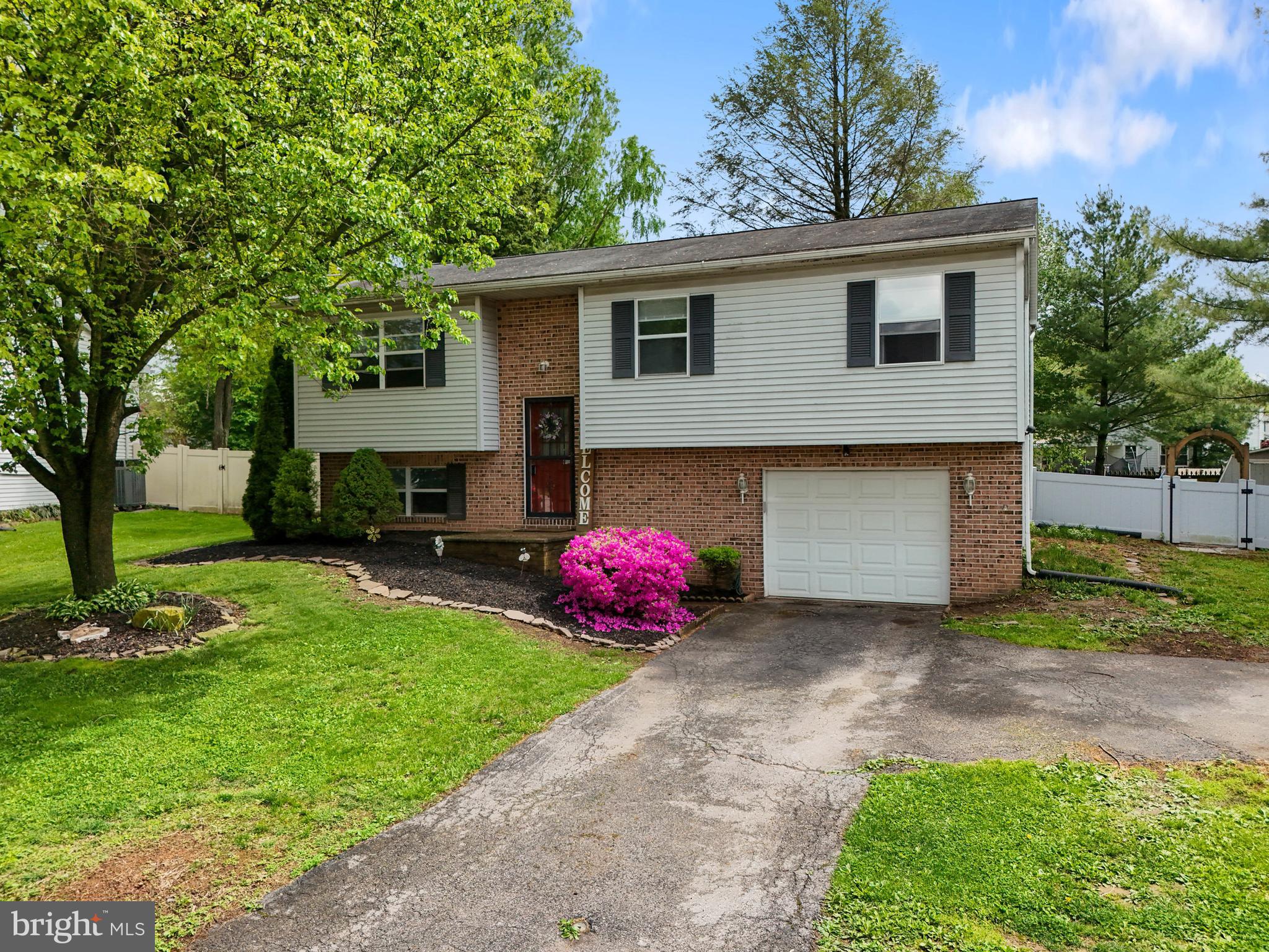 3530 Middleboro Road Dover, PA 17315 - Photo 5 of 57 a front view of a house with garden