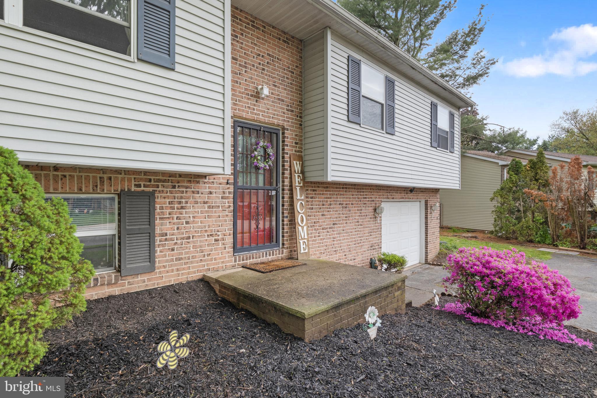 3530 Middleboro Road Dover, PA 17315 - Photo 9 of 57 a view of a house with a yard and potted plants