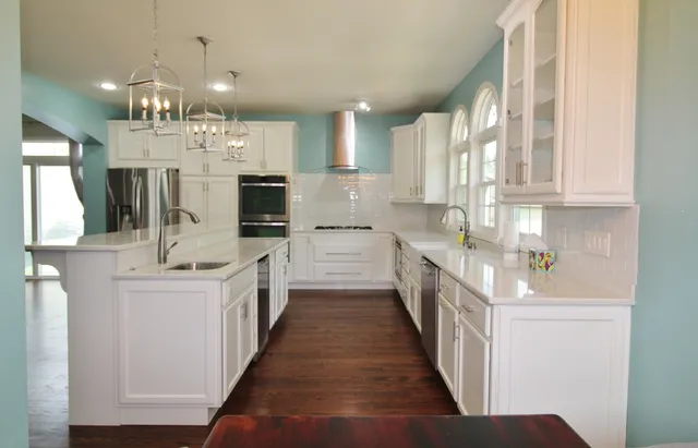 a room with a table and a potted plant