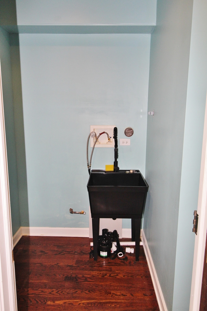 187 West Union Street Seneca, IL 61360 - Photo 17 of 51 a room with a table and a potted plant