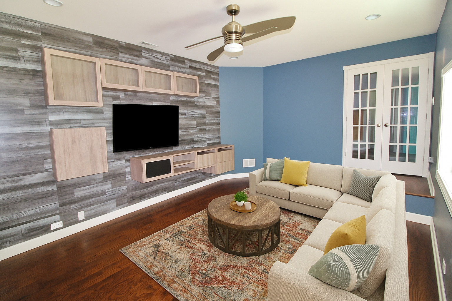 187 West Union Street Seneca, IL 61360 - Photo 18 of 51 a living room with furniture a flat screen tv and kitchen view