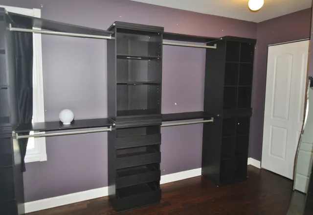 a bathroom with a sink double vanity and a mirror
