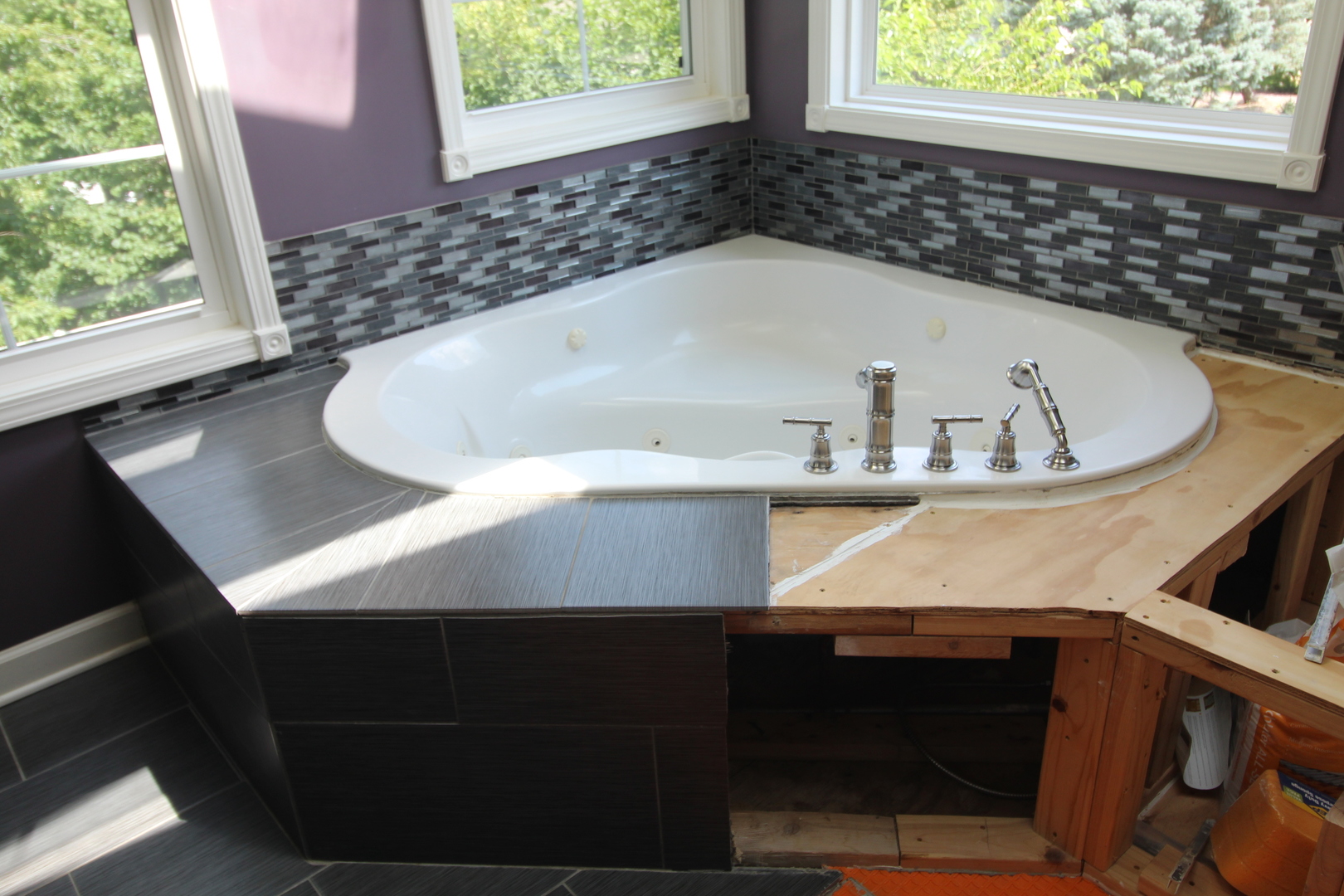 187 West Union Street Seneca, IL 61360 - Photo 27 of 51 a bathroom with a bathtub and a window