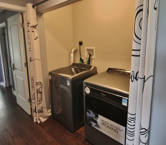 a bathroom with a sink double vanity and a mirror