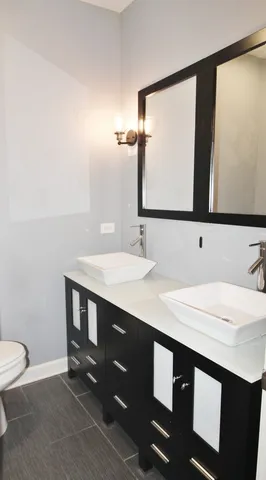 a view of a balcony with wooden floor