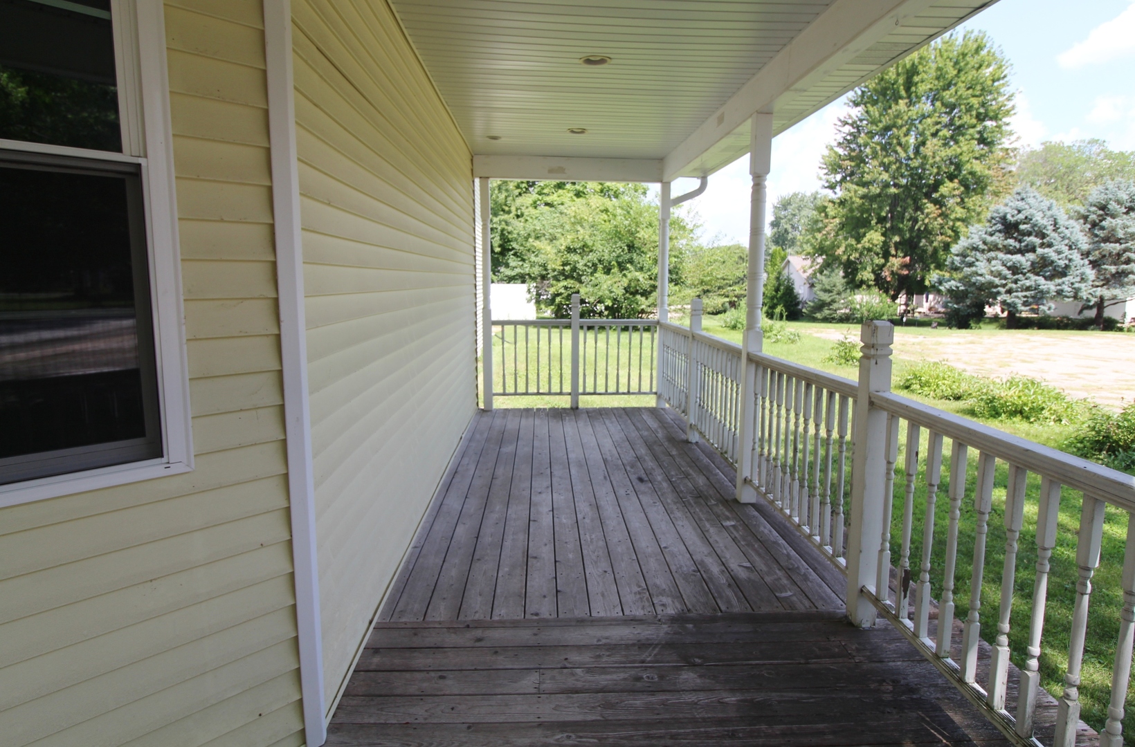 187 West Union Street Seneca, IL 61360 - Photo 39 of 51 a view of a balcony with wooden floor