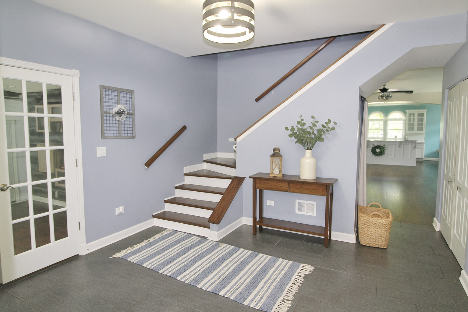 187 West Union Street Seneca, IL 61360 - Photo 5 of 51 a view of an entryway with wooden floor and a front door