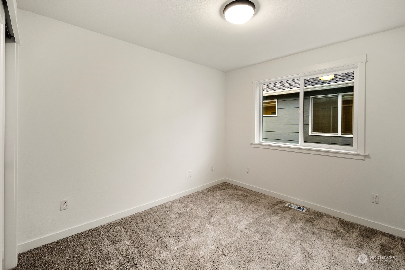 3906 211th Place Southeast Bothell, WA 98021 - Photo 26 of 31 a view of empty room with windows