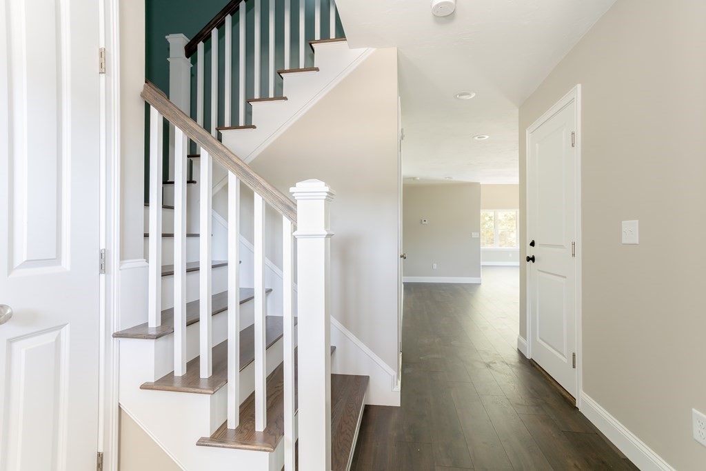 4 Katlyn Circle Rochester, MA 02770 - Photo 21 of 37 a view of entryway with wooden floor
