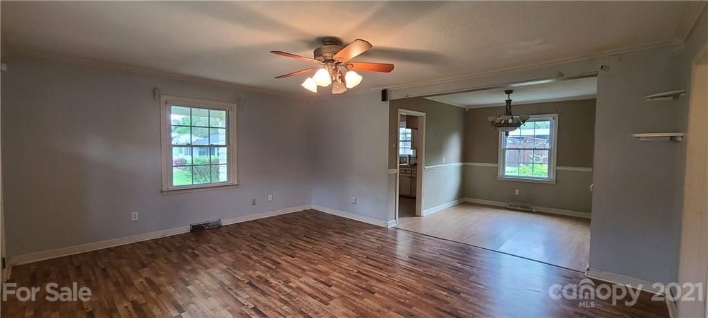 350 Rucker Road Rutherfordton, NC 28139 - Photo 2 of 13 wooden floor in an empty room with a window