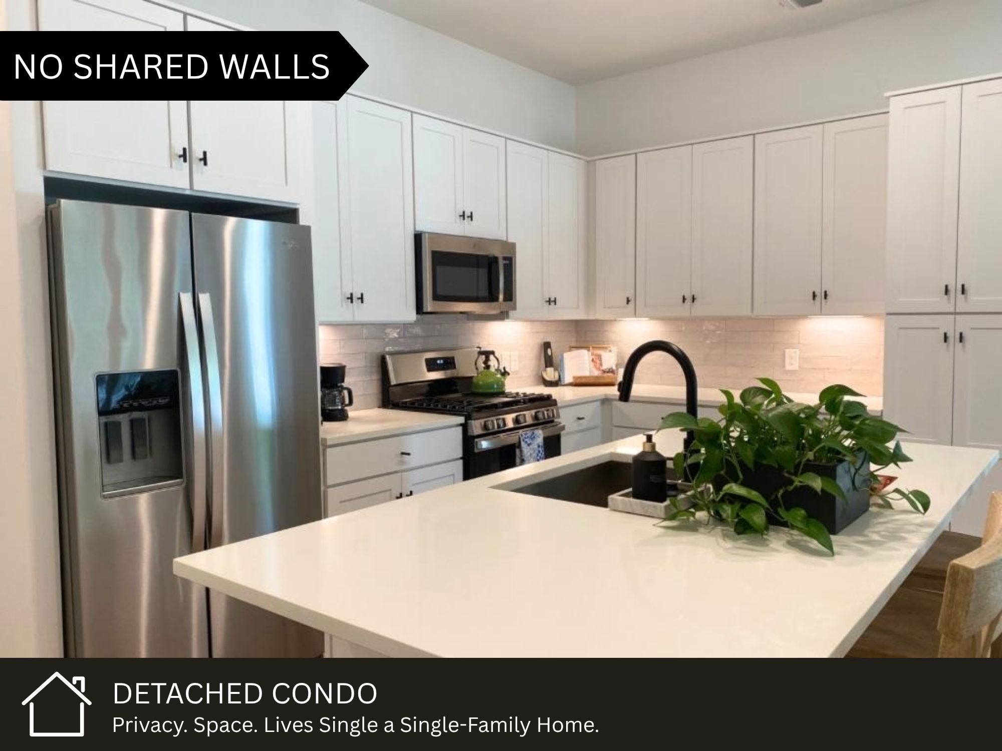 3809 Valley View Road, Unit 12 Austin, TX 78704 - Photo 1 of 1 Contemporary kitchen featuring white shaker-style cabinetry, stainless steel appliances, white countertops, a subway tile backsplash, and an island with an integrated sink