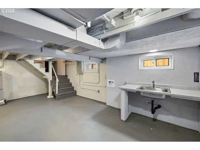 a view of a workspace with furniture