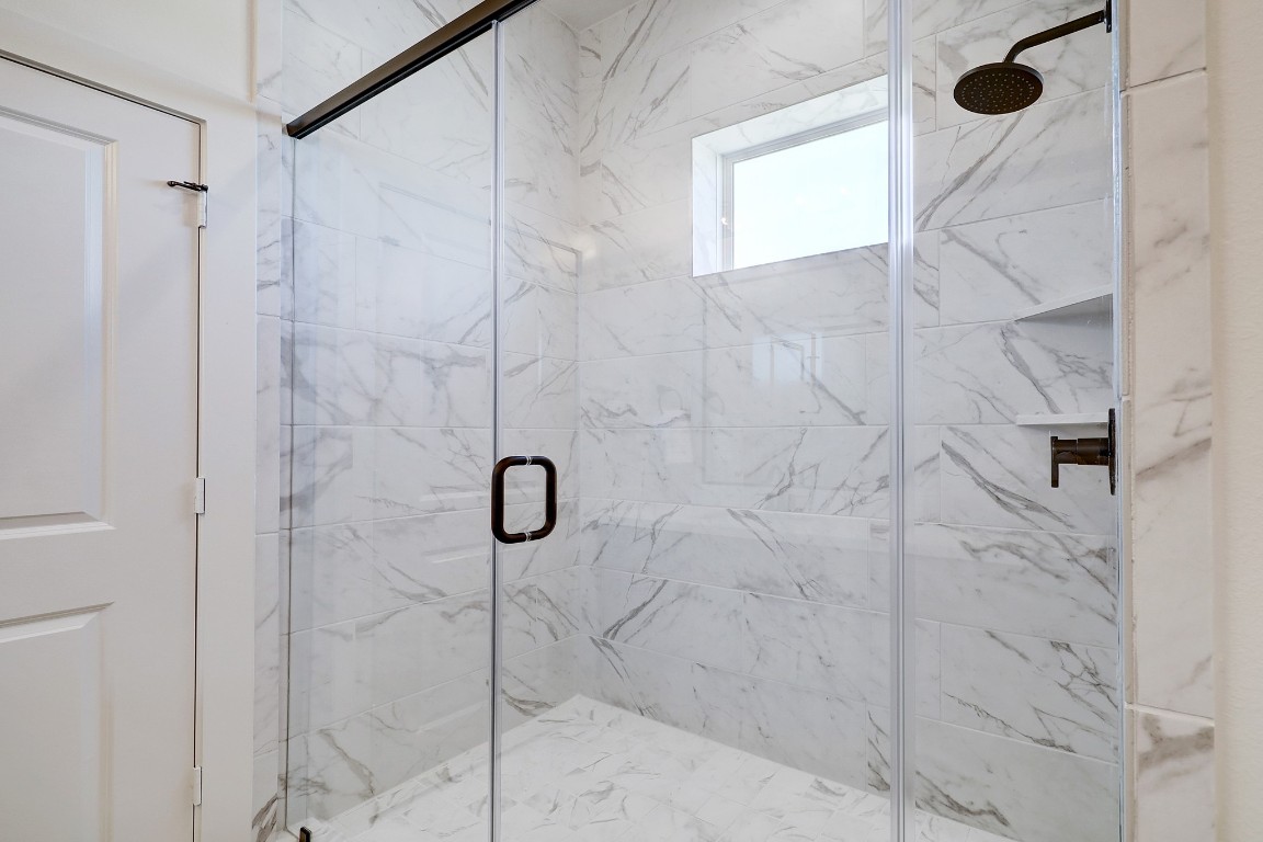 5242 Texas Street Houston, TX 77011 - Photo 22 of 27 a bathroom with a shower