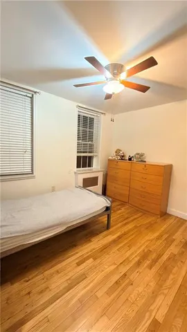 a bathroom with a double vanity sink toilet and shower