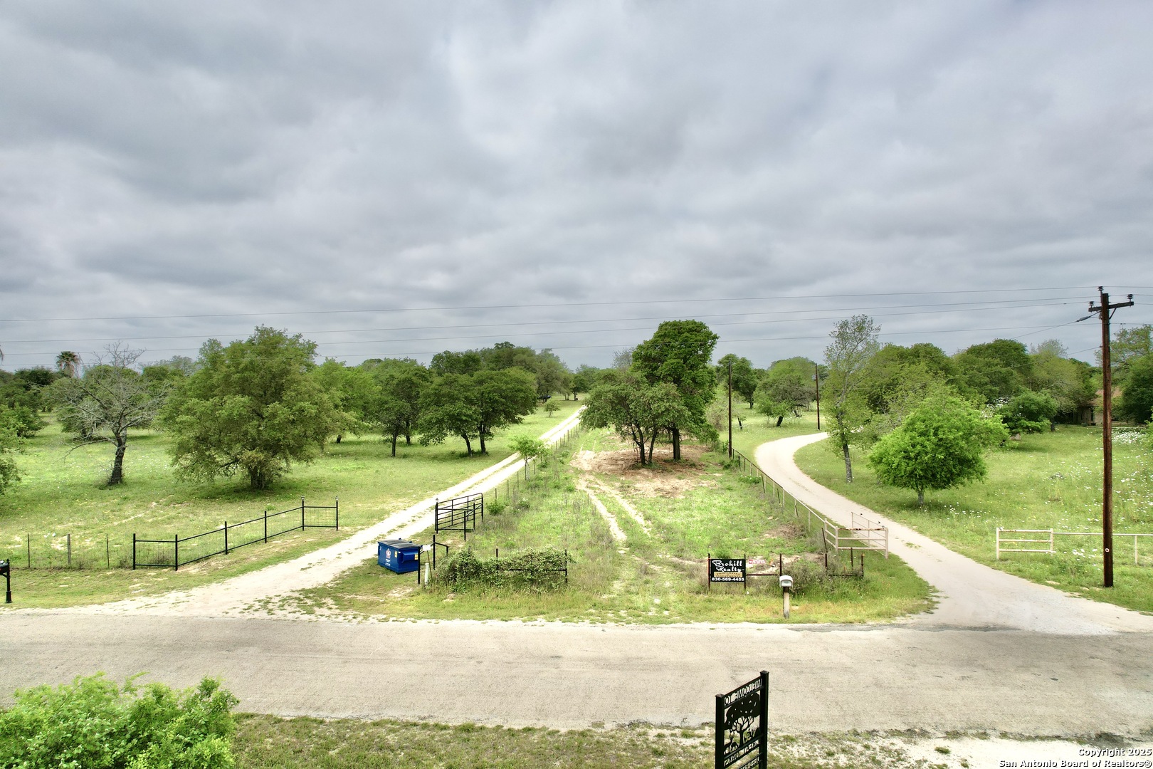 7711 Devine Tx 78016 Devine, TX 78016 - Photo 26 of 51 a view of a swimming pool with a yard and plants