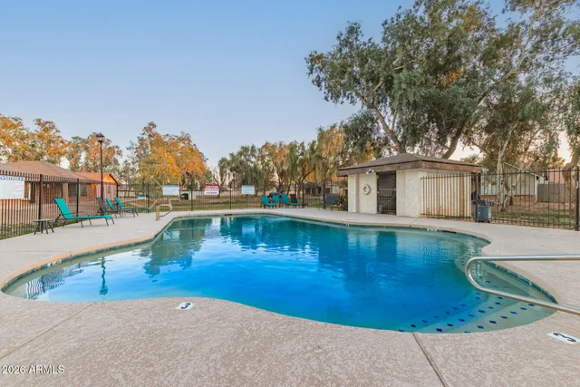 a view of a house with swimming pool