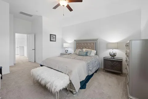 an aerial view of a house with a lake view