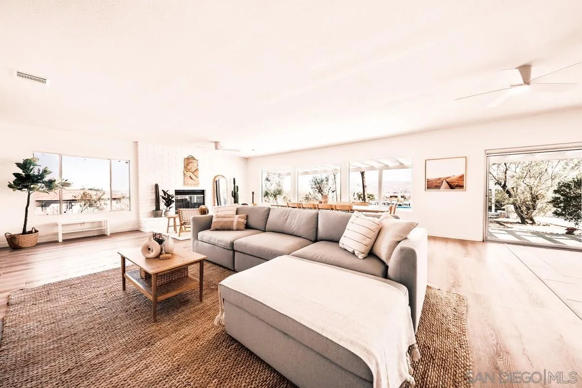 3900 Ave Tortuga Joshua Tree, CA 92252 - Photo 21 of 28 a living room with furniture and a table