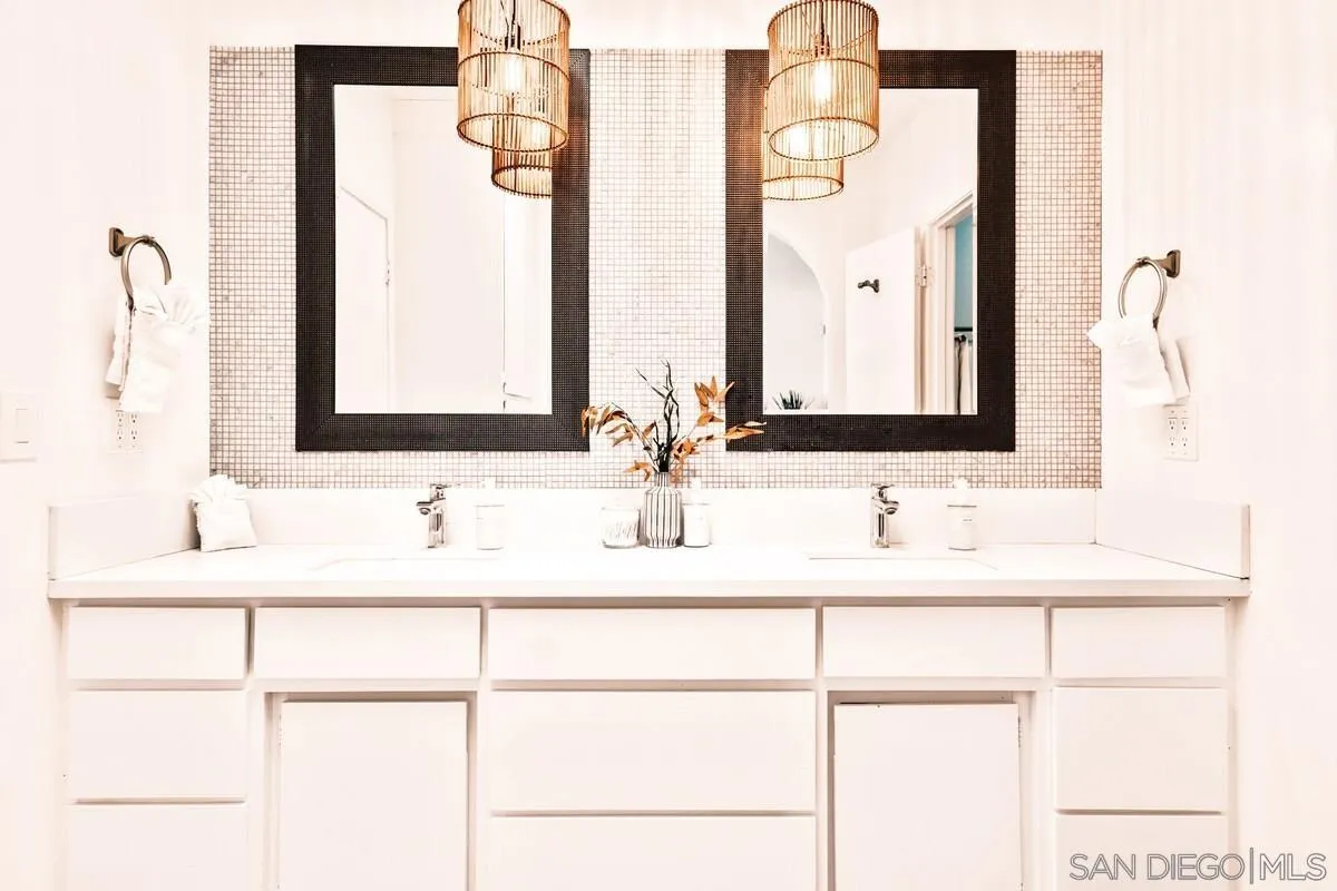 3900 Ave Tortuga Joshua Tree, CA 92252 - Photo 9 of 28 a bathroom with a double vanity sink mirror and