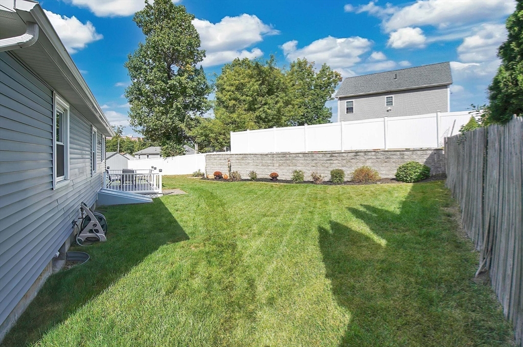 92 Agnes Street Springfield, MA 01118 - Photo 27 of 29 a view of a back yard of the house