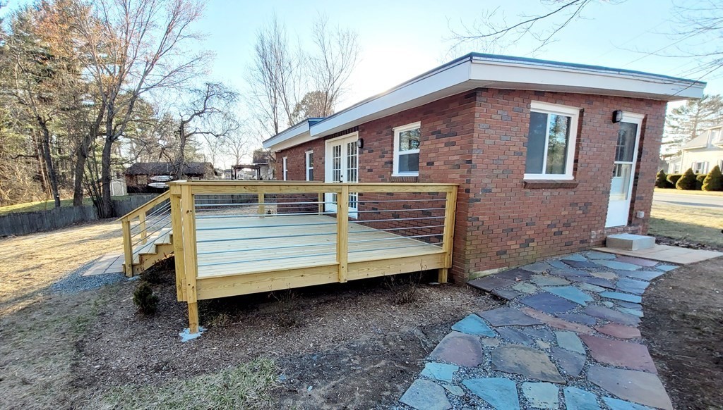 9 Belanger Road Southampton, MA 01073 - Photo 4 of 19 a front view of a house with a yard