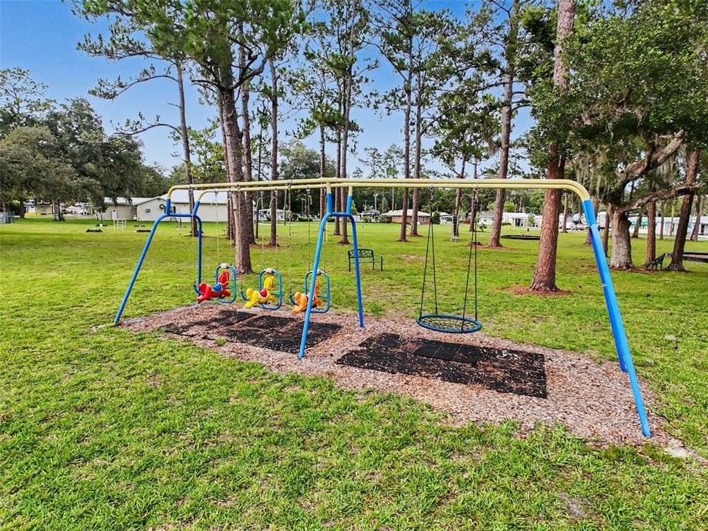 2092 Culbreath Road, Unit A42 Brooksville, FL 34602 - Photo 29 of 70 a view of a park with large trees