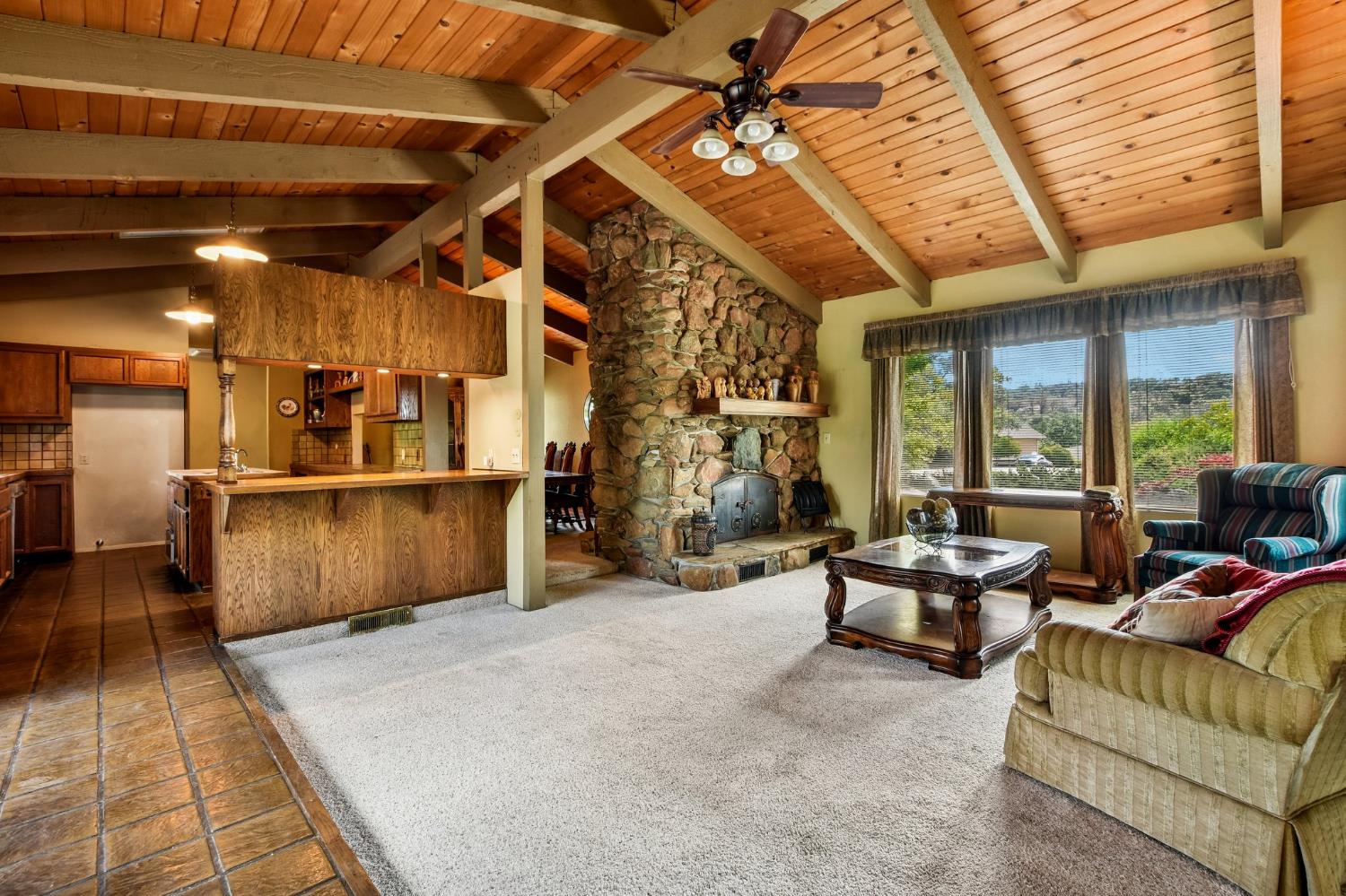 6180 Rustic Hills Drive Rocklin, CA 95677 - Photo 3 of 37 a view of a living room with furniture