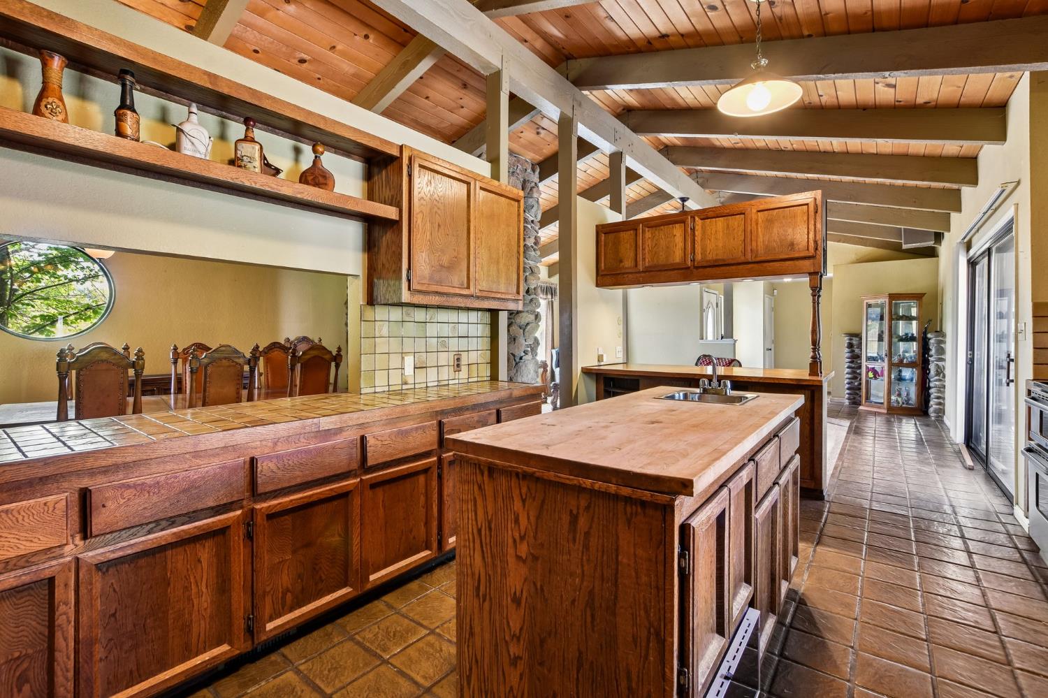 6180 Rustic Hills Drive Rocklin, CA 95677 - Photo 9 of 37 a kitchen with a stove and a sink