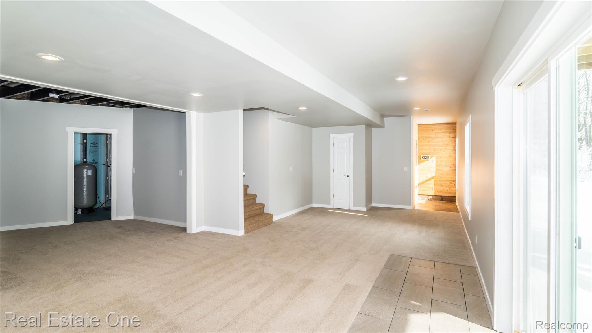 4018 Hartland Road Hartland, MI 48353 - Photo 43 of 54 Finished Walkout Basement