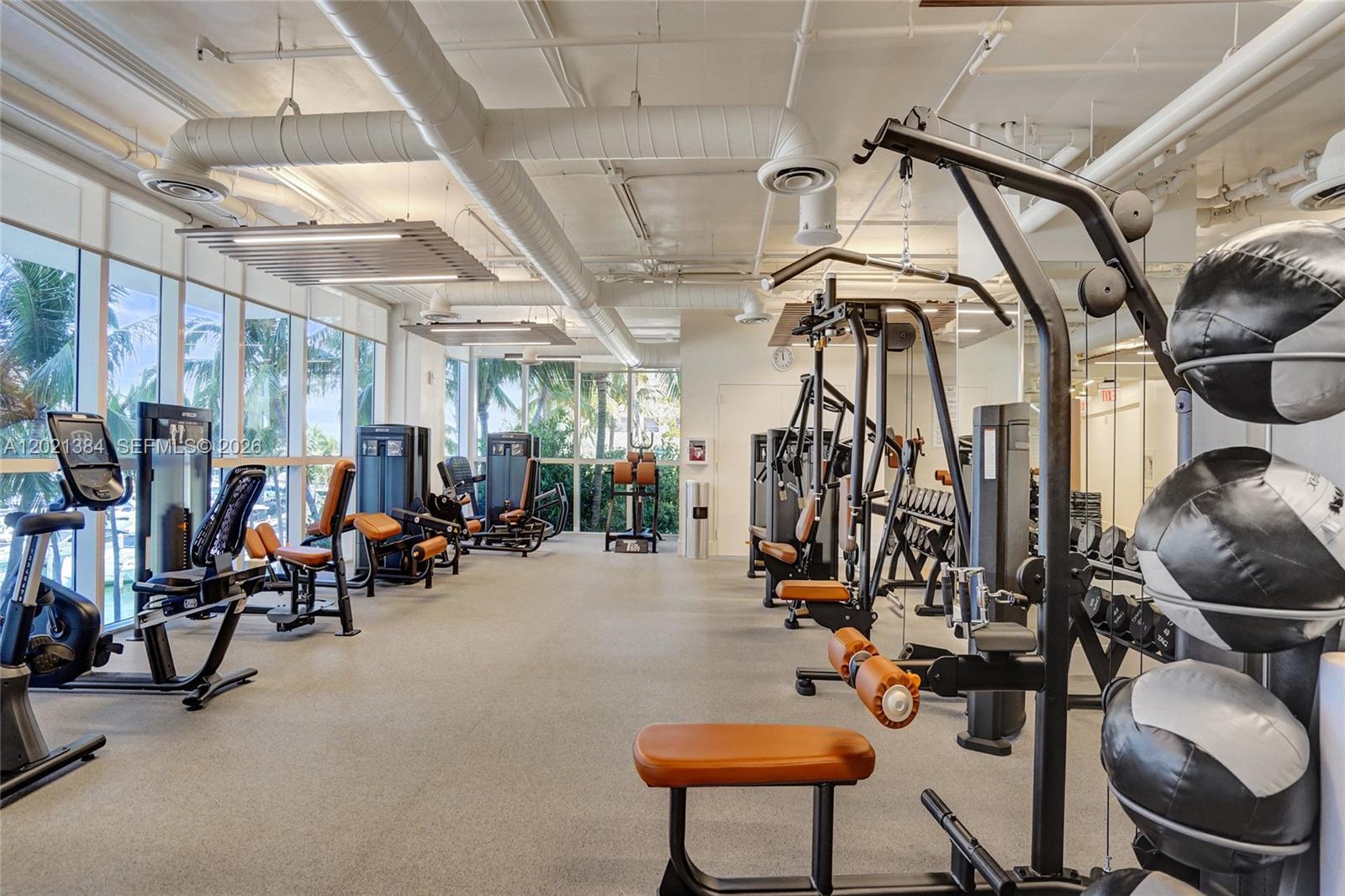 400 Alton Road, Unit PH11 Miami Beach, FL 33139 - Photo 45 of 49 a view of a room with gym equipment