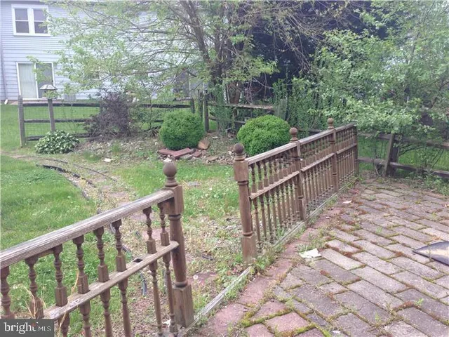 a view of backyard with green space