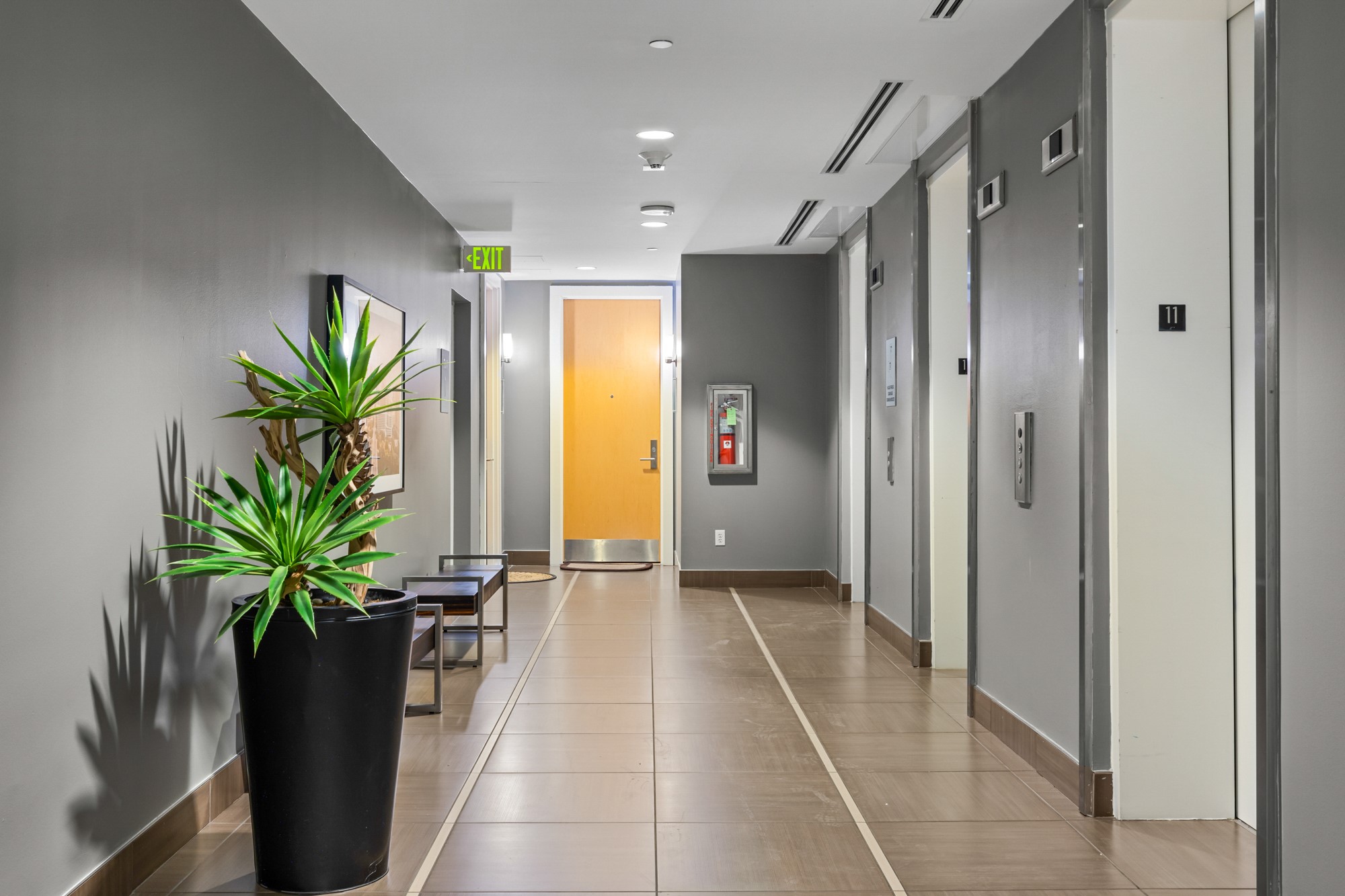603 Davis Street, Unit 907 Austin, TX 78701 - Photo 17 of 22 Modernized hallway with elevator banks. The Elevators are fast. This building did NOT lose power during our winter storms. Recently updated building throughout!