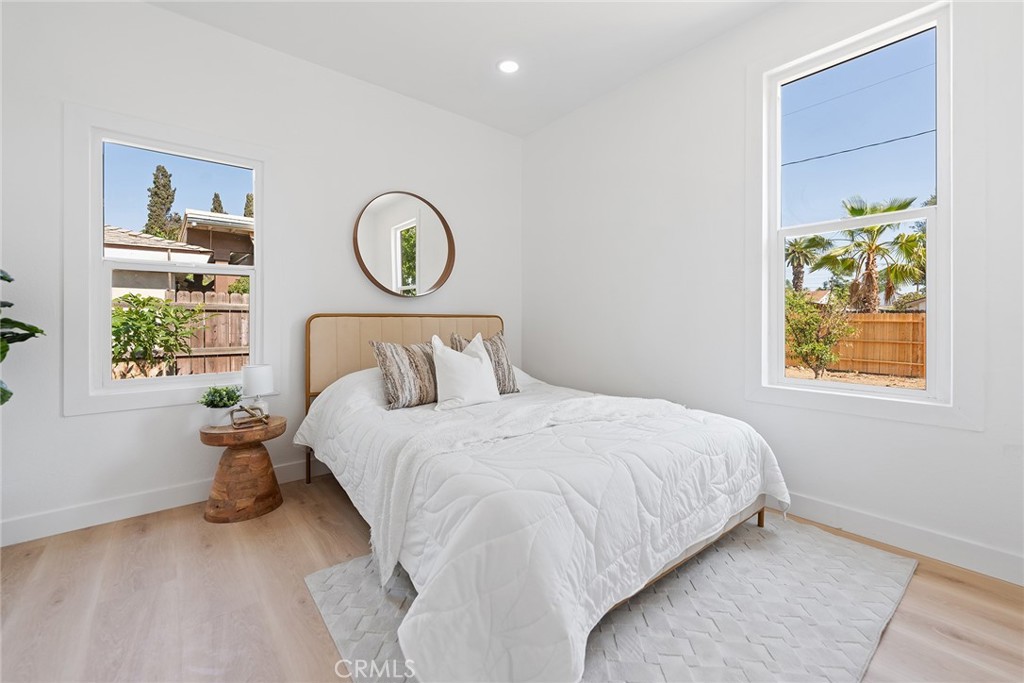 2158 Tenth Street Riverside, CA 92507 - Photo 16 of 24 a bedroom with a bed and a window
