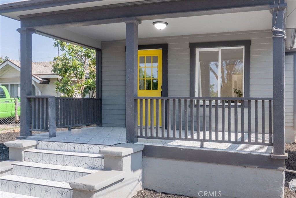 2158 Tenth Street Riverside, CA 92507 - Photo 2 of 24 a view of a house with a wooden fence