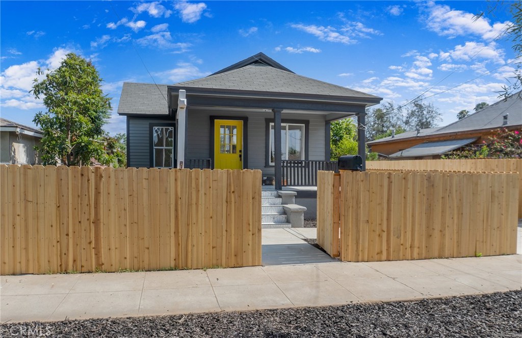 2158 Tenth Street Riverside, CA 92507 - Photo 3 of 24 a view of a house with wooden fence