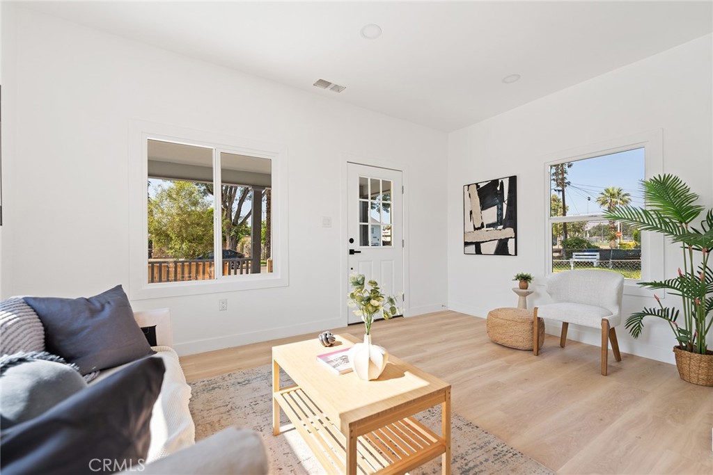 2158 Tenth Street Riverside, CA 92507 - Photo 6 of 24 a living room with furniture and a window