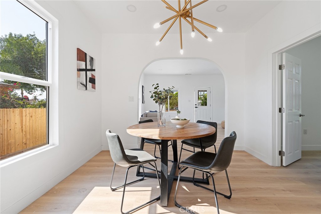 2158 Tenth Street Riverside, CA 92507 - Photo 10 of 24 a view of a dining room with furniture window and wooden floor