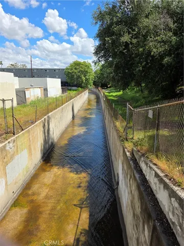 a view of a street with cars