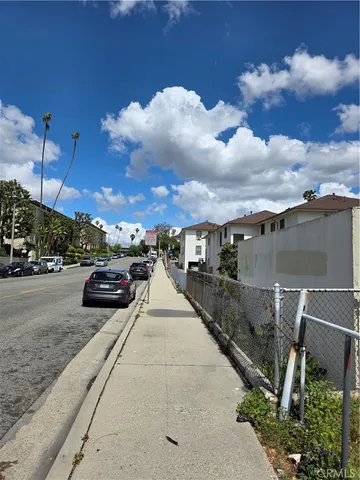 a front view of a house with a yard and a garage